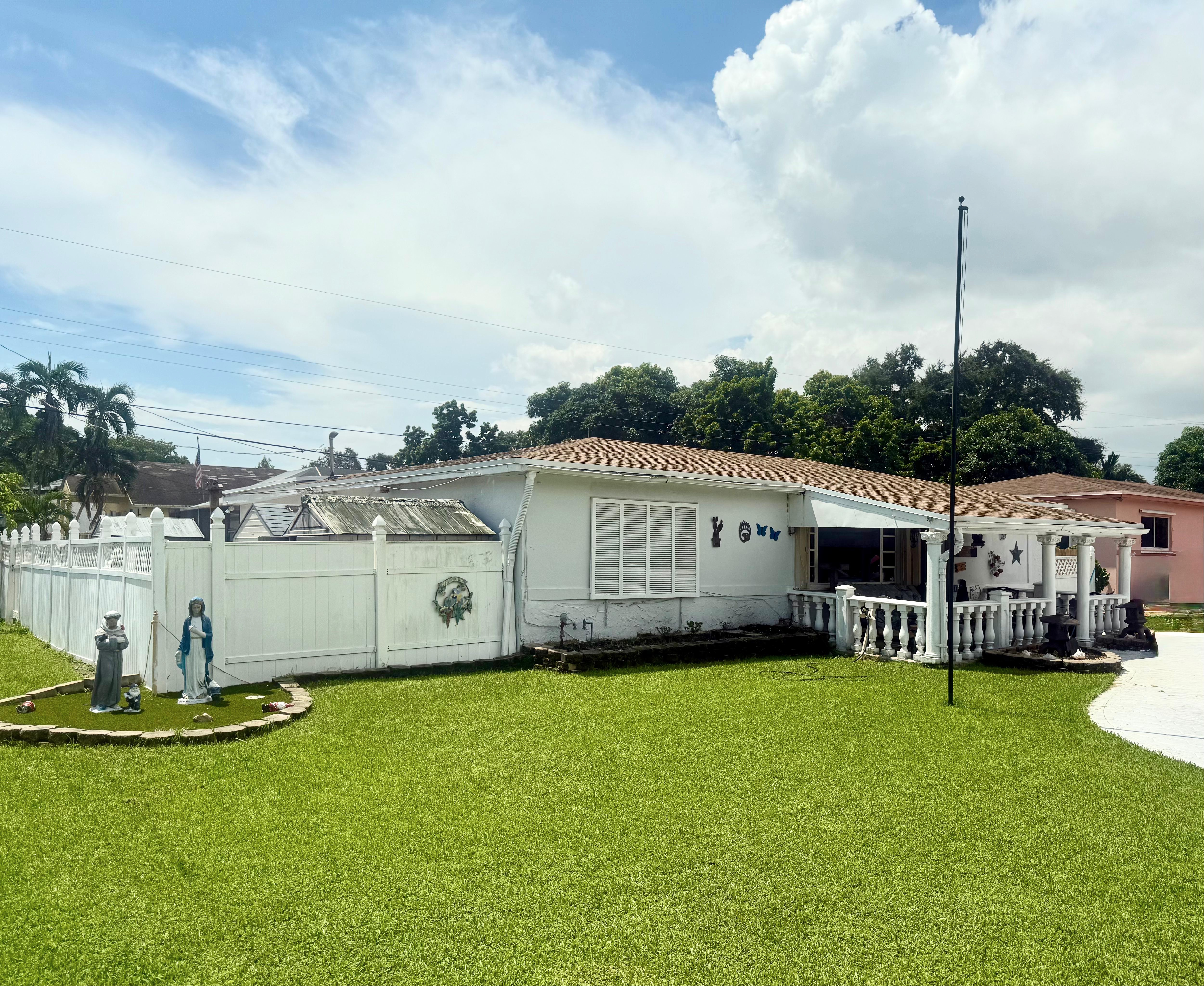 Backyard view with screened pool